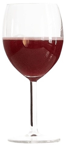 A half-full glass with red wine